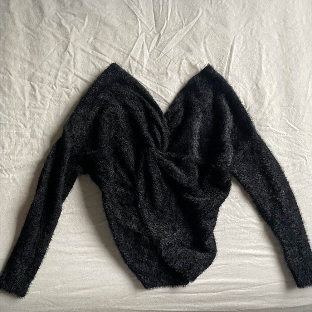 Francesca’s cashmere sweater